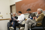 From left to right: Richard Rice, Gregory Boyd, Stephen Harnish, and Carl Helrich participate in a panel discussion by Andrews University