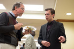 Honors Scholar Nelson Starkey (right) explains his poster to Biology professor Thomas Goodwin (left) by Andrews University