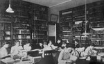 [Students and teachers in the library at Emmanuel Missionary College]