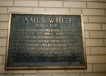 Plaque by the entrance to James White Library, Andrews University by James White Library